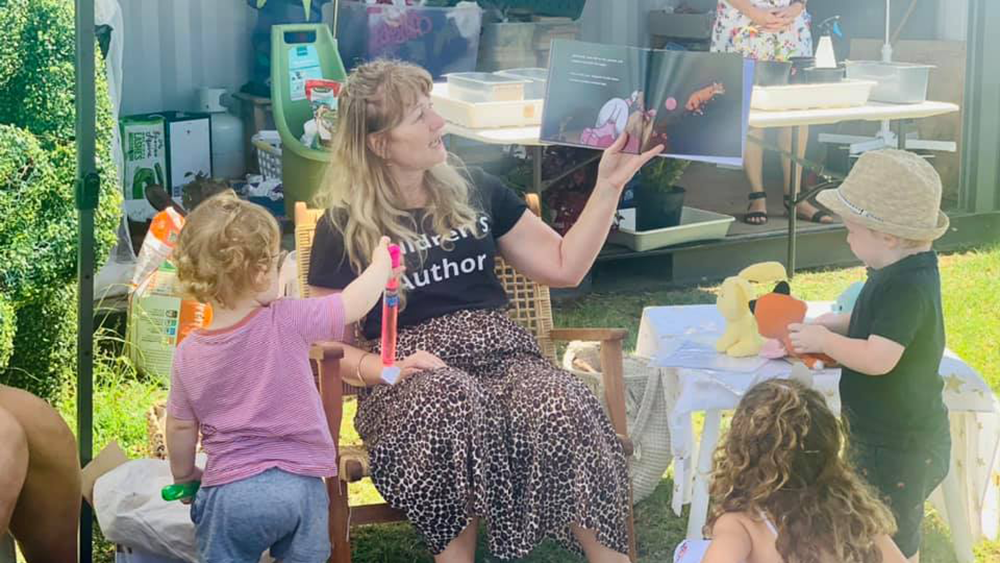 Feb Vegan Markets author reading book
