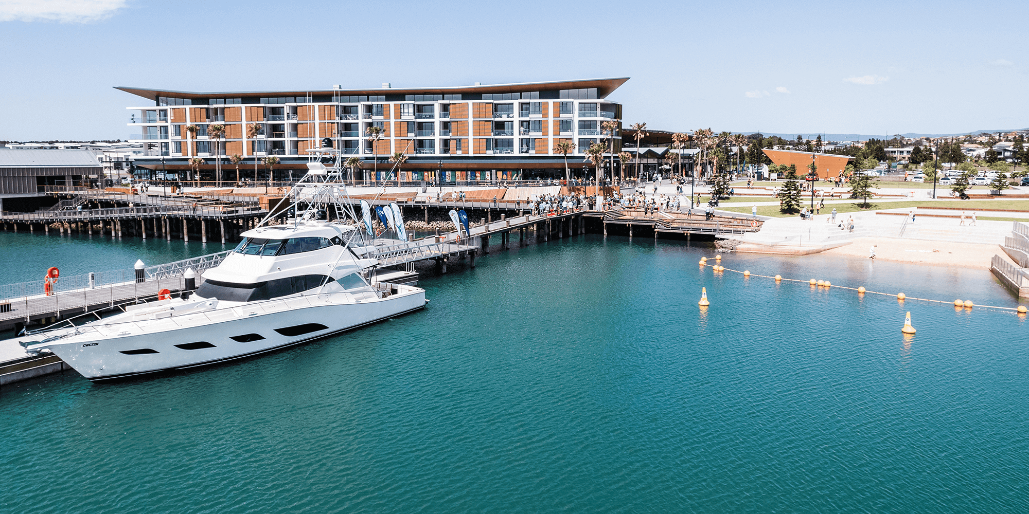 First boat docked with beach