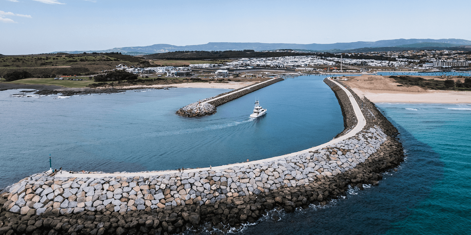 First boat into marina