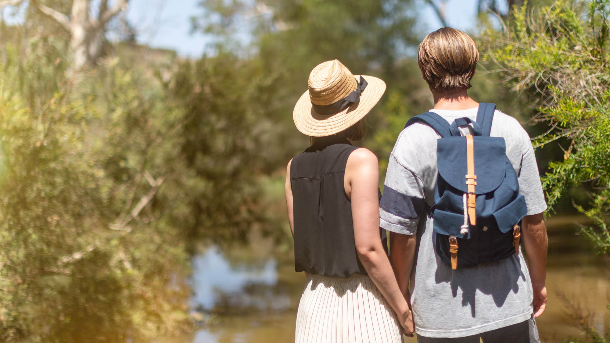 Couple by the river