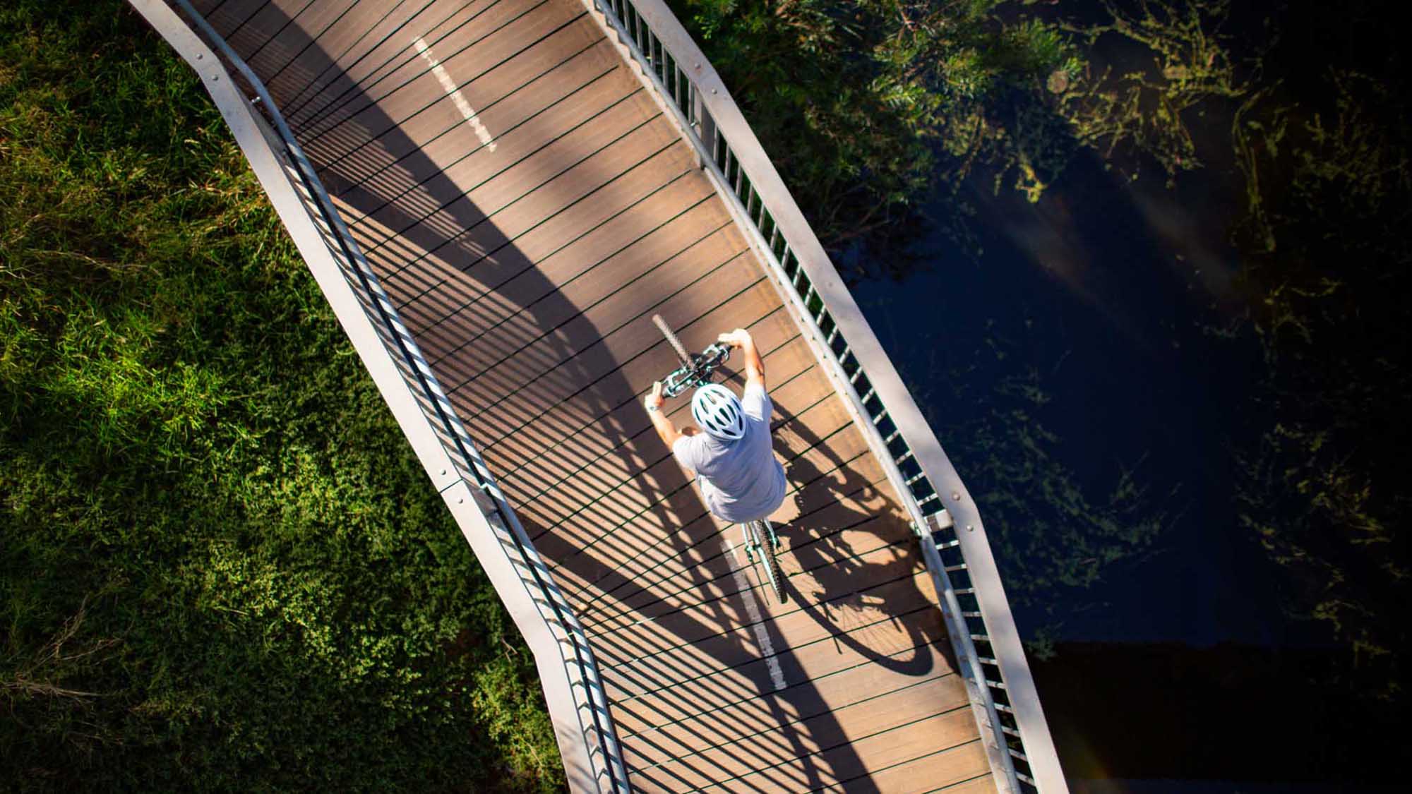 Cyclist on bridge