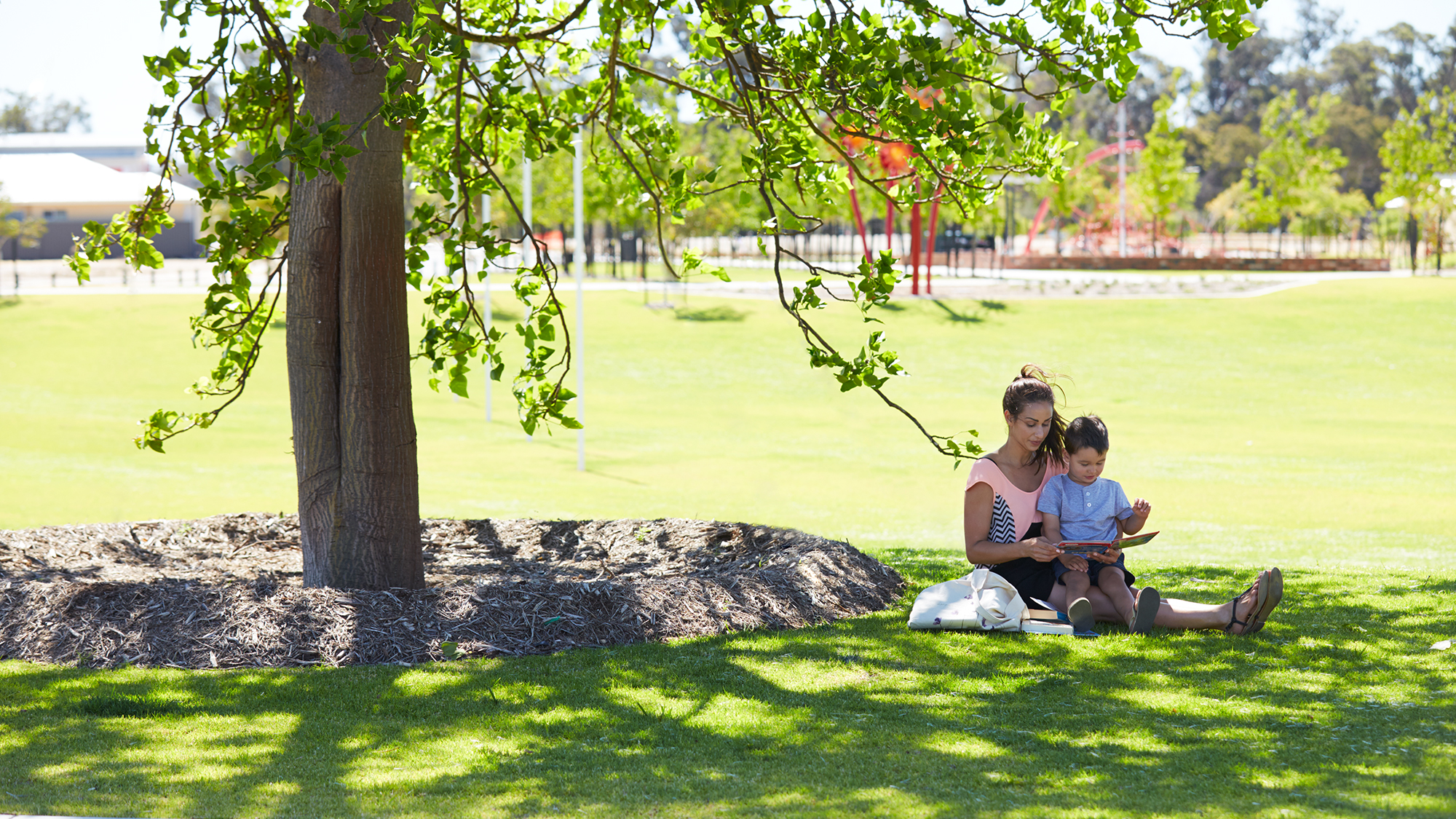 Mum and son in park